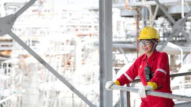 Employee on site looking over the operations at the facility