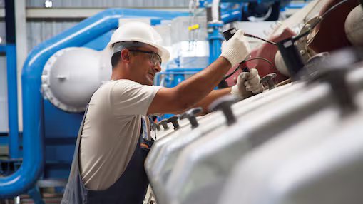 Engineer working on engine
